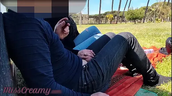 Risky Public Park Handjob: MILF Teacher Strokes Big Cock for Voyeurs